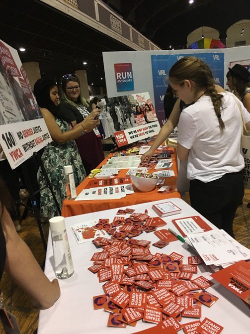 Women at YWCA table at the USOW Summit